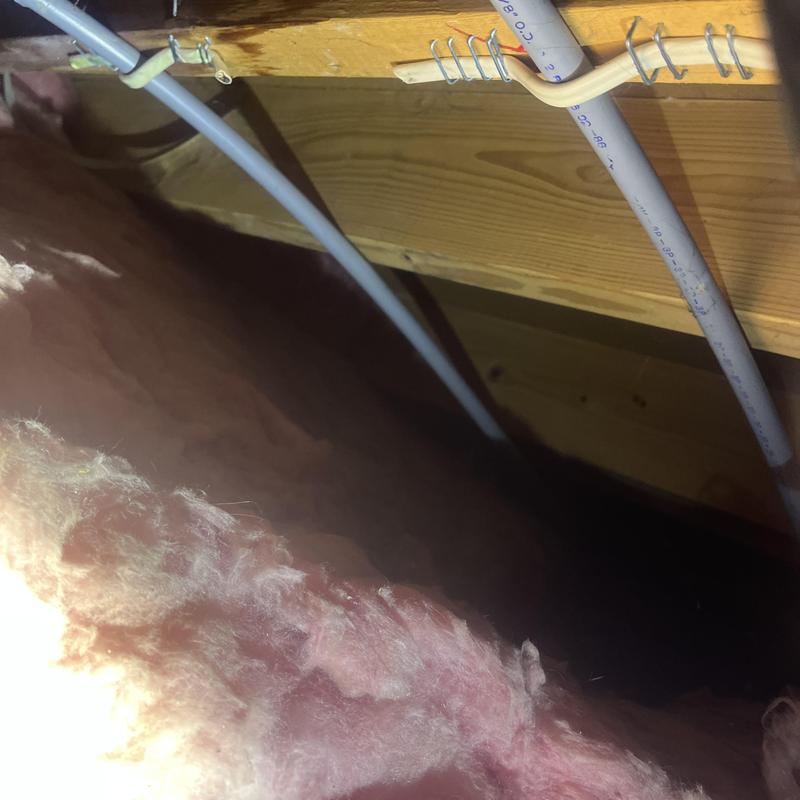 PEX water piping and fittings in attic cavity