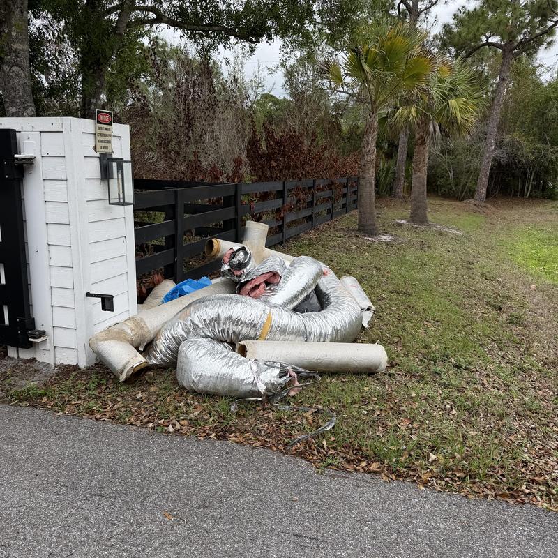 R-6 ductwork removed and discarded by roadside