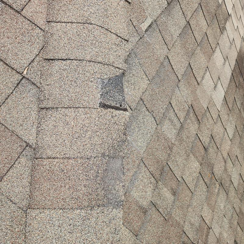 30-year asphalt shingles with damage and granular loss