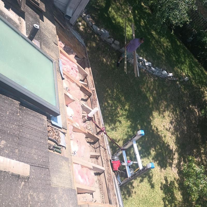 Concrete tile roof decking removal with insulation exposed