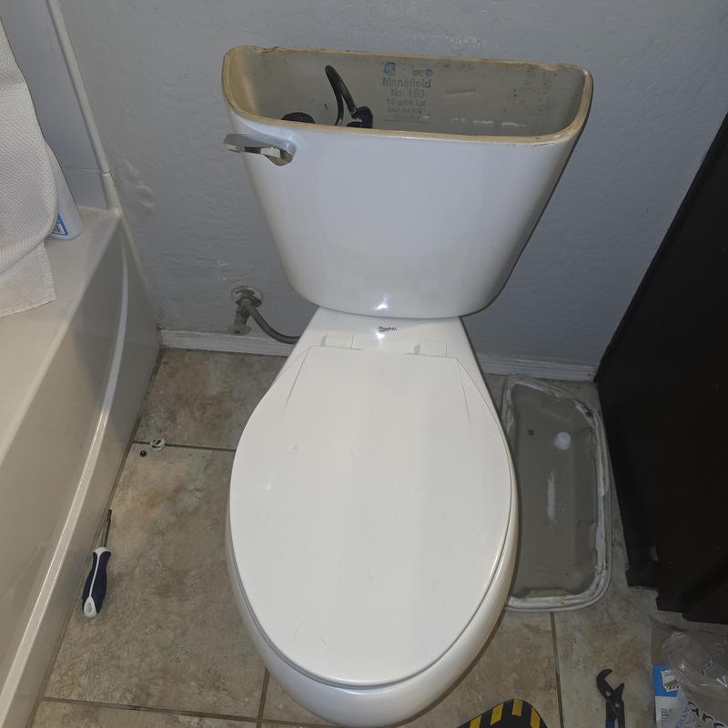 Toilet tank installation with angle stop and supply line