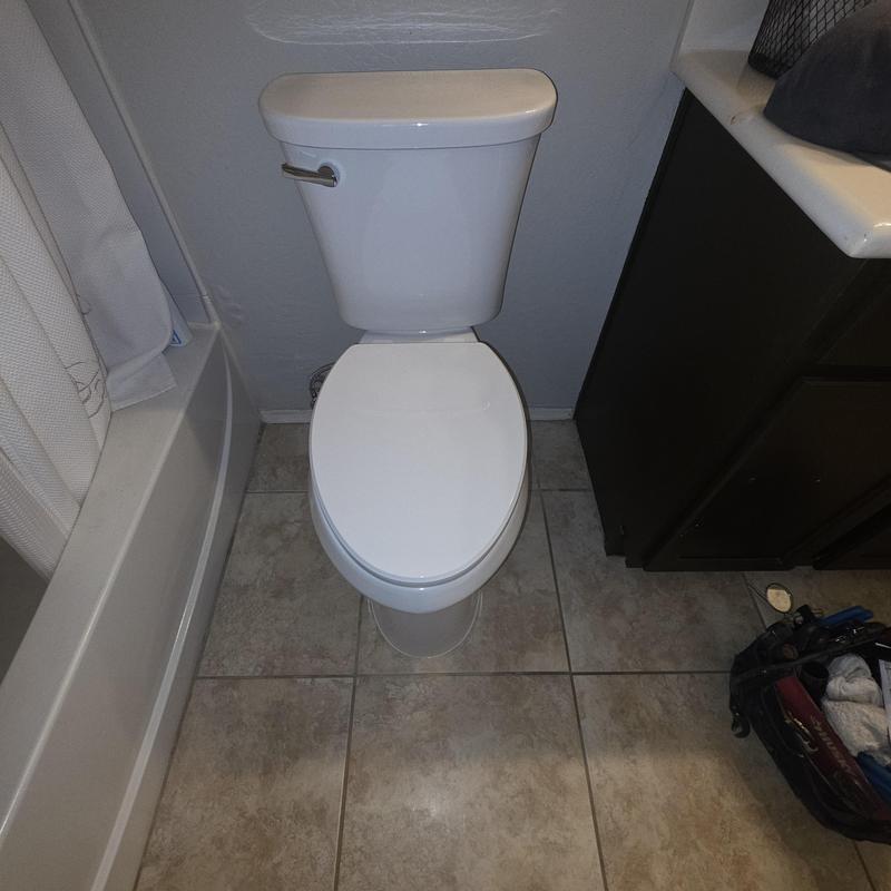 Toilet installation with supply line and angle stop