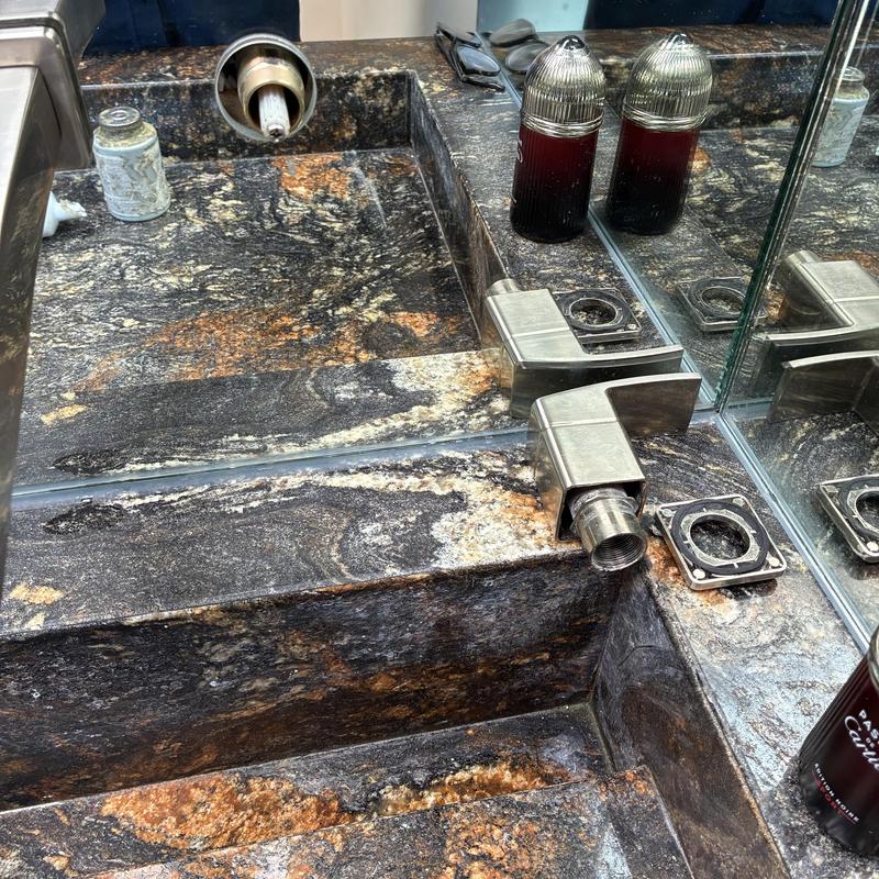 Wall-mounted bathroom faucet handle reattachment