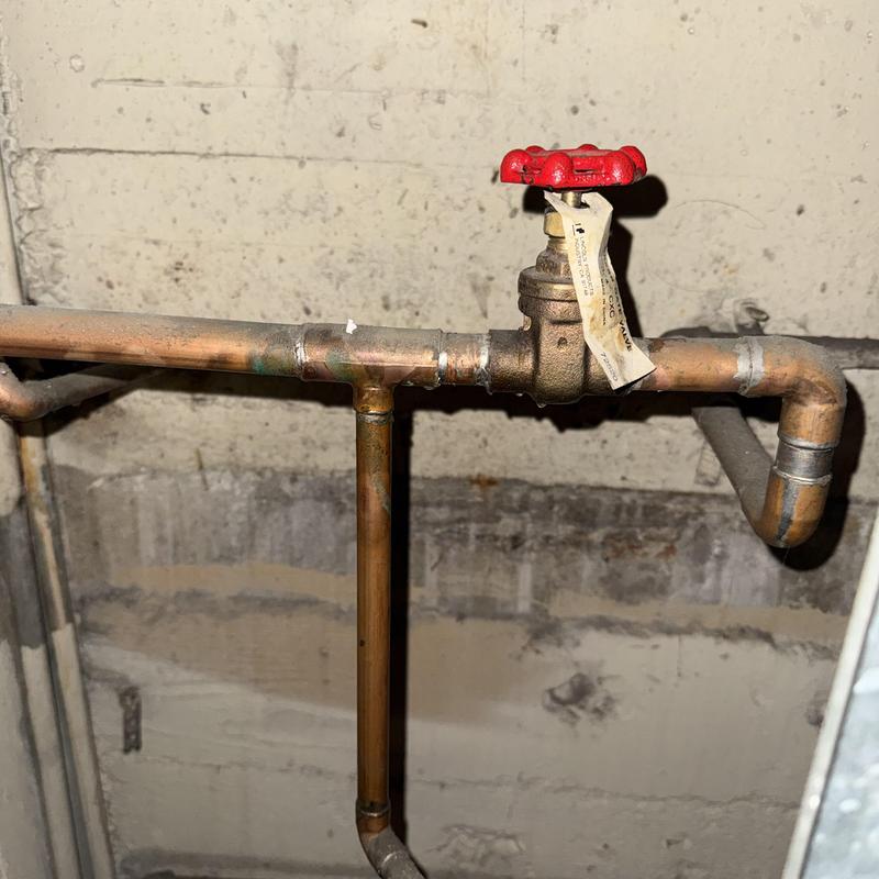 Flushometer valve water supply pipe with shutoff valve