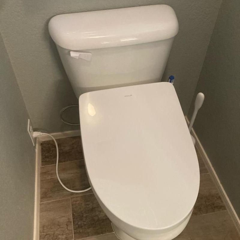 Bidet toilet installation with plumbing connections Bidet toilet installation with plumbing connections