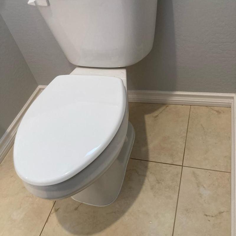 Toilet with new wax ring and hardware installation Toilet with new wax ring and hardware installation