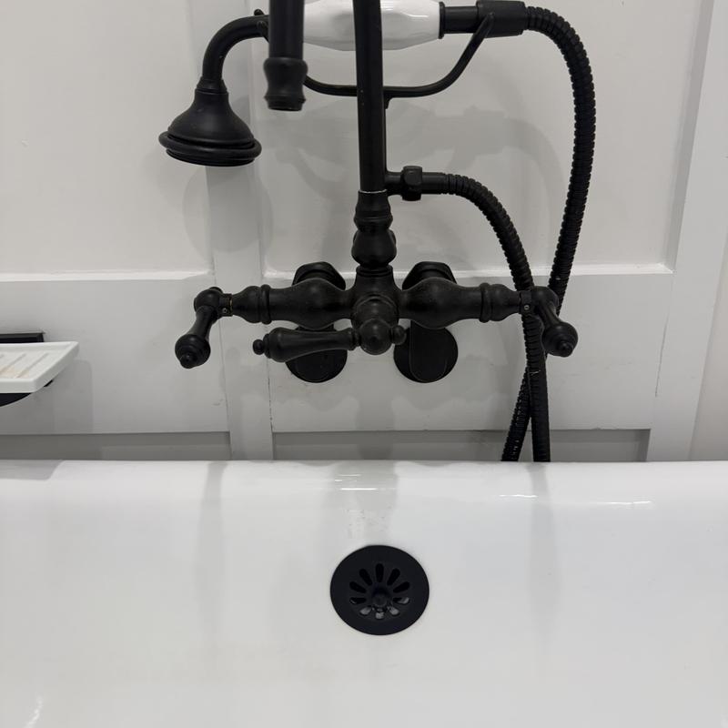 Matte black clawfoot tub faucet and showerhead installation