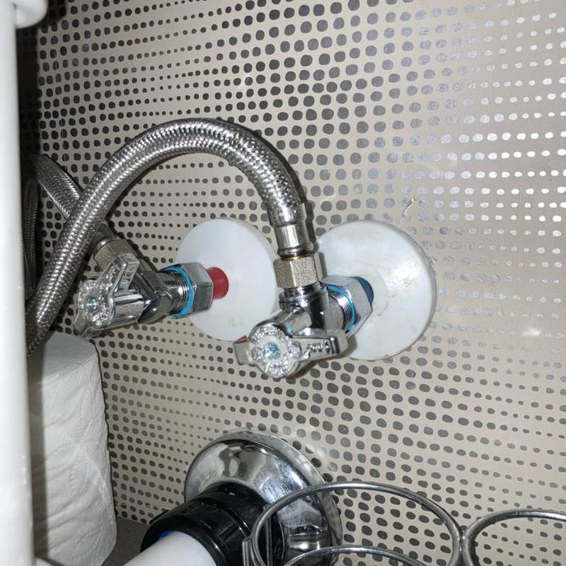 Angle stop valves with braided supply lines installed Angle stop valves with braided supply lines installed