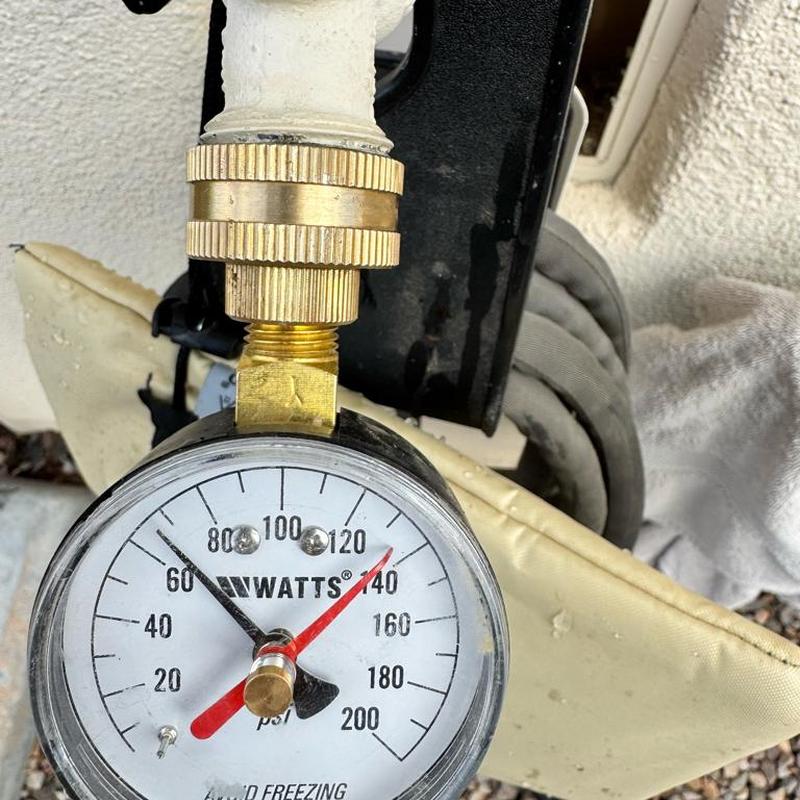 Pressure gauge on irrigation main line measuring psi Pressure gauge on irrigation main line measuring psi