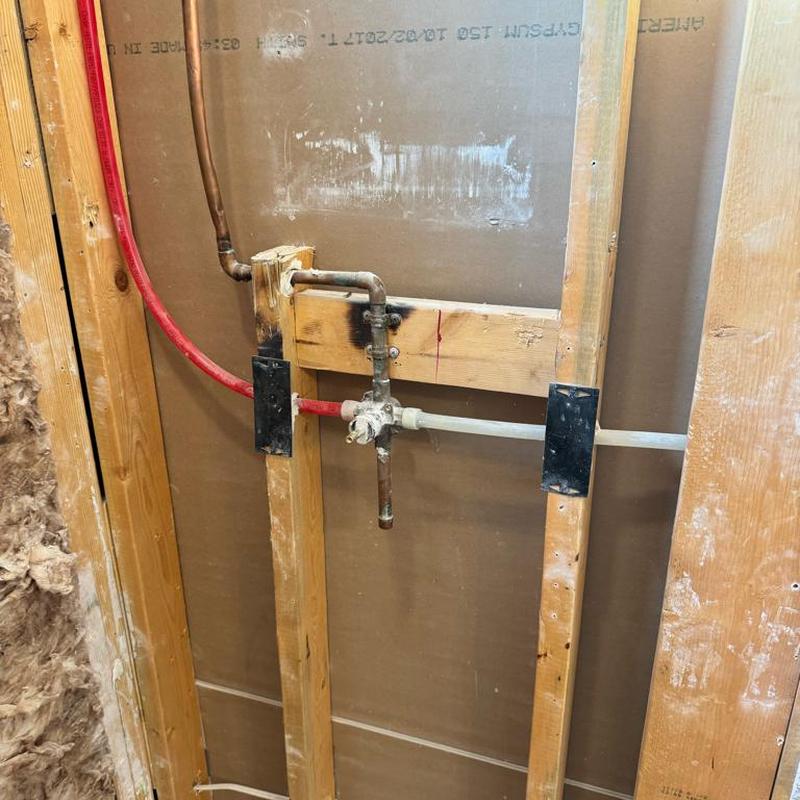 Shower valve plumbing with copper and PEX pipes