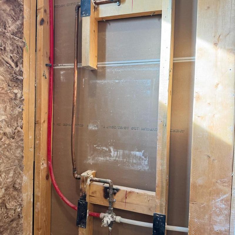 Kohler shower valve installation with plumbing pipes