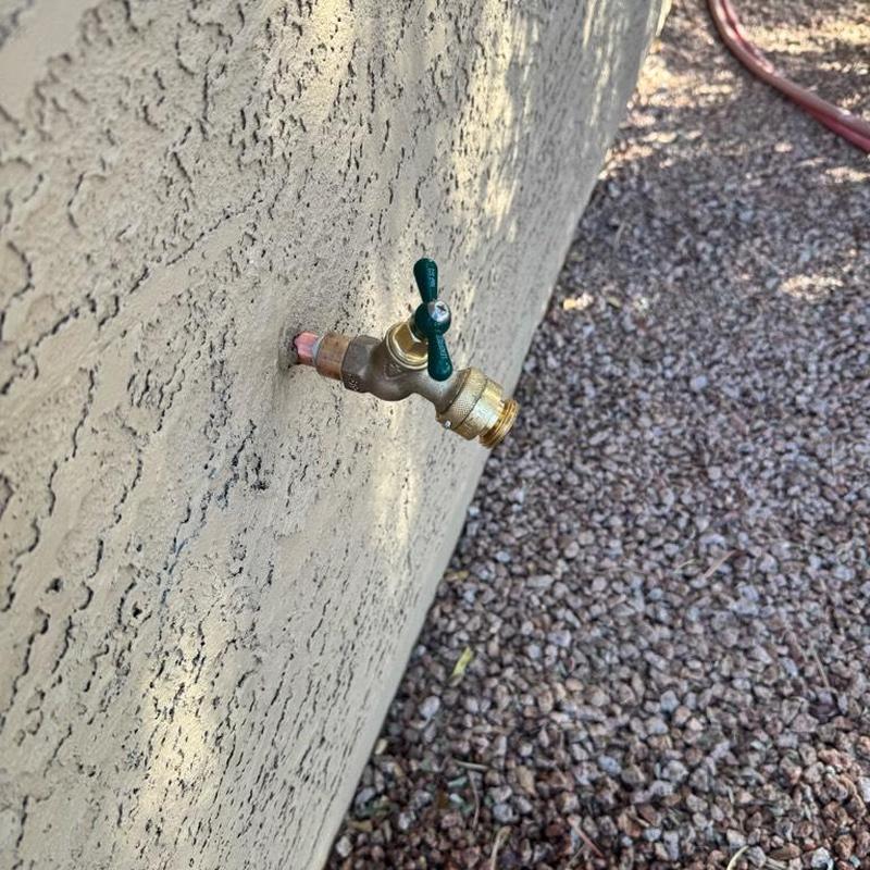 Outdoor hose bib with pressure vacuum breaker installation