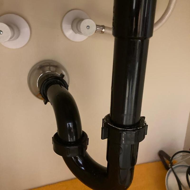P-trap drain pipe installation under sink