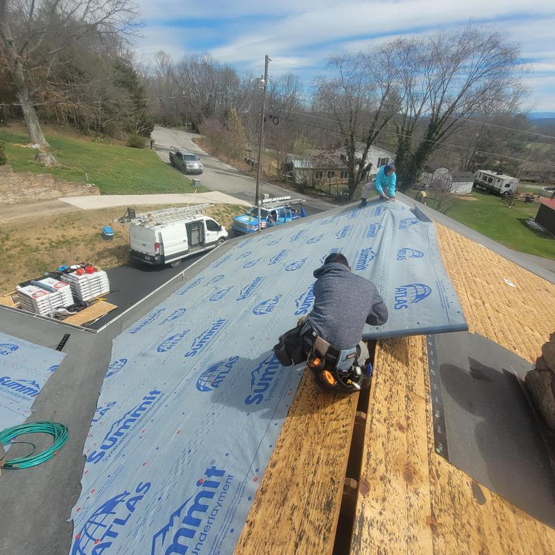 Roof underlayment installation over replaced decking