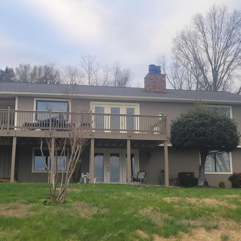 Atlas shingle roof with replaced wood decking on house