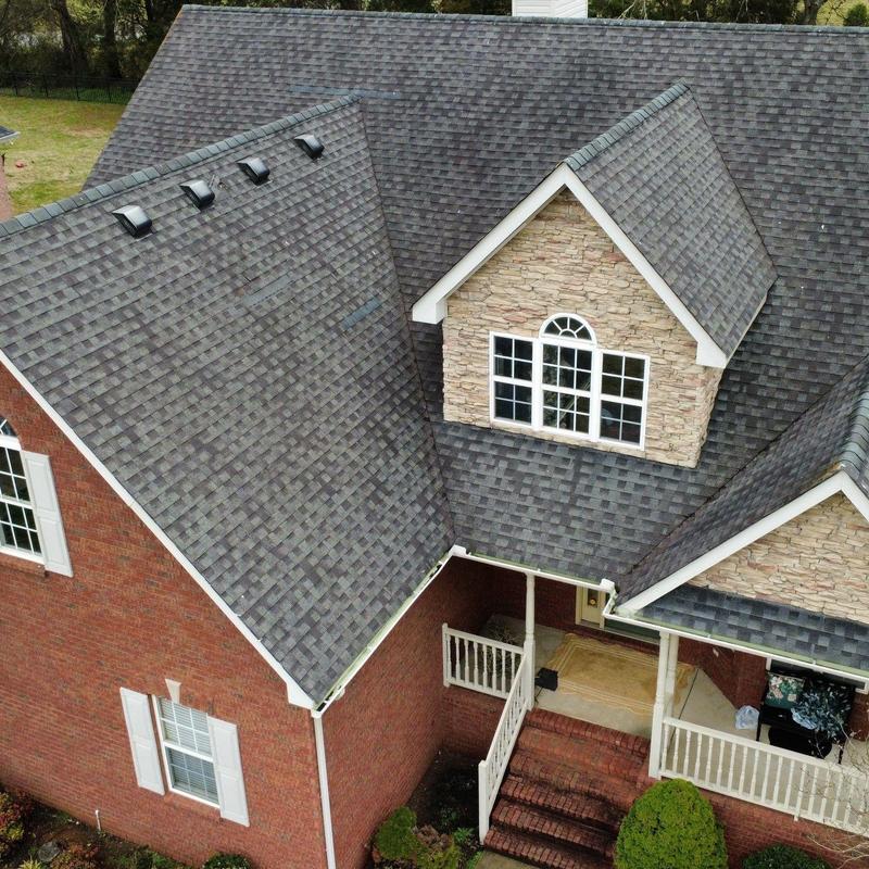 Asphalt shingle roof storm damage inspection