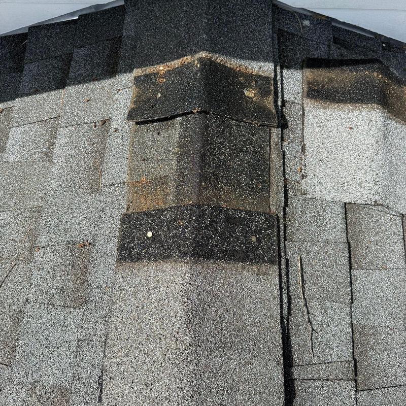 Ridge cap shingles with improper underlayment overlap