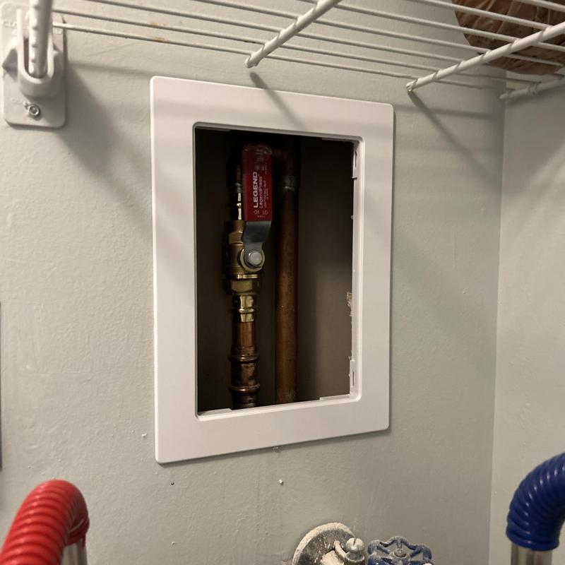 Main shut off valve with drywall access panel installed