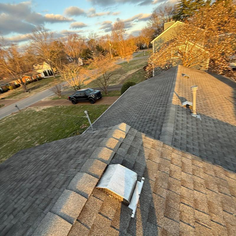 Roof vent inspection on residential shingle roof