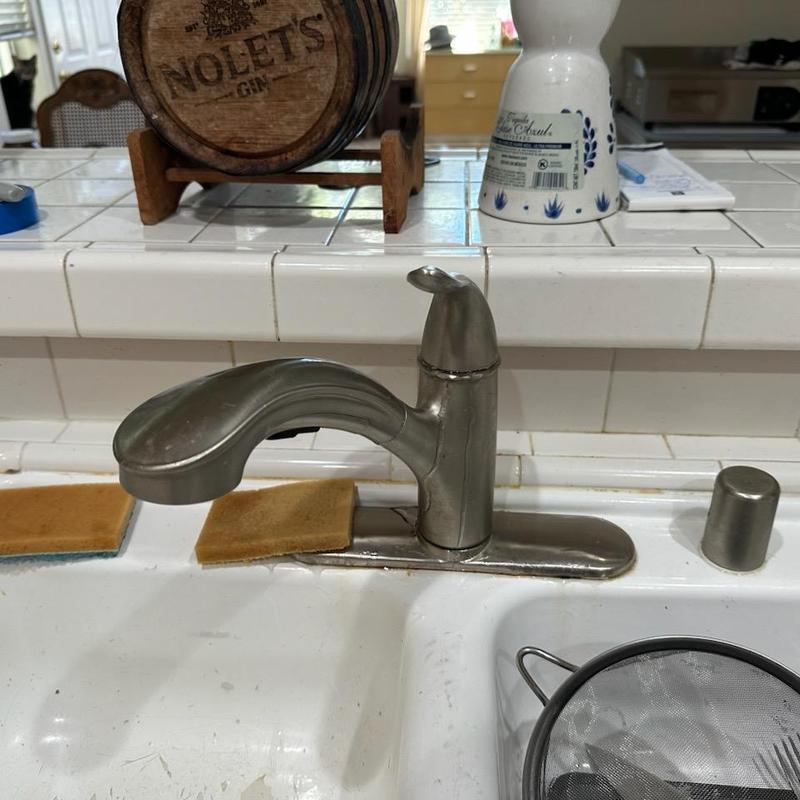 Delta kitchen faucet replacement on tile countertop