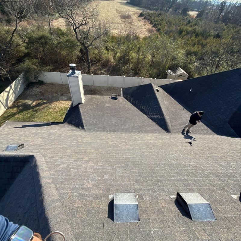 Asphalt shingle roof inspection with damage assessment