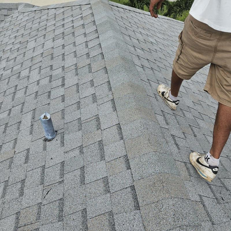 Shingle roof ridge with inspection in Cape Coral Florida