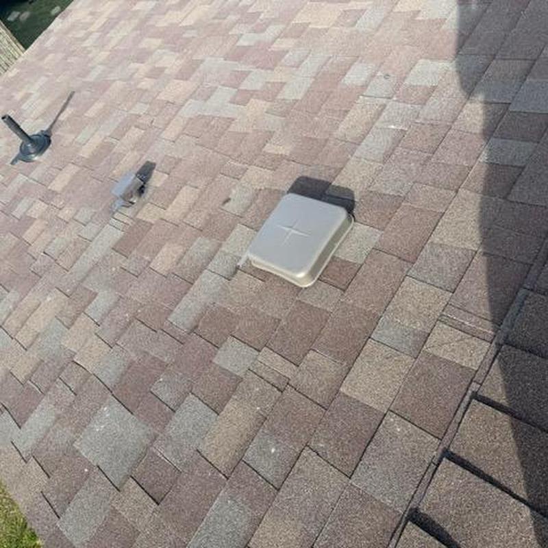 Architectural shingle roof with vent cover installation