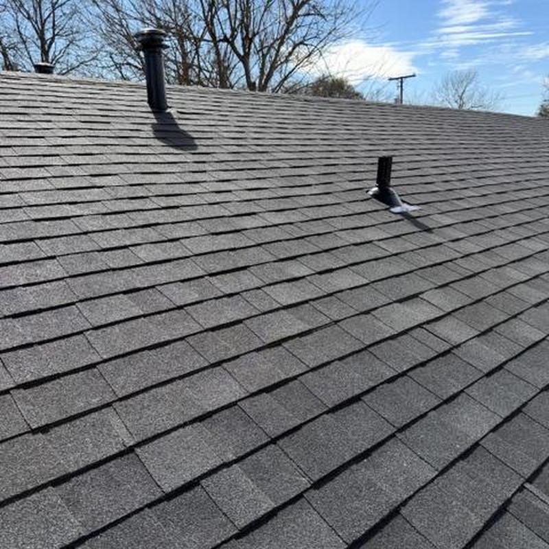 Asphalt shingle roof with vent pipes in Fort Worth Texas