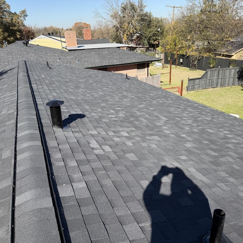 Black Owens Corning architectural shingle roof installation