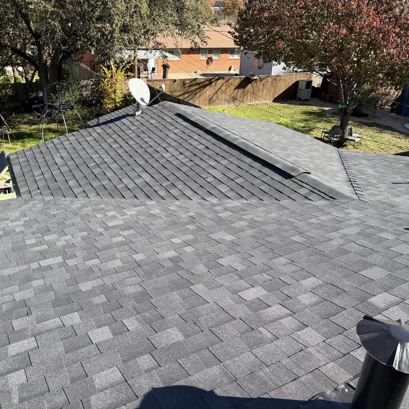 Black Owens Corning architectural shingle roof installation