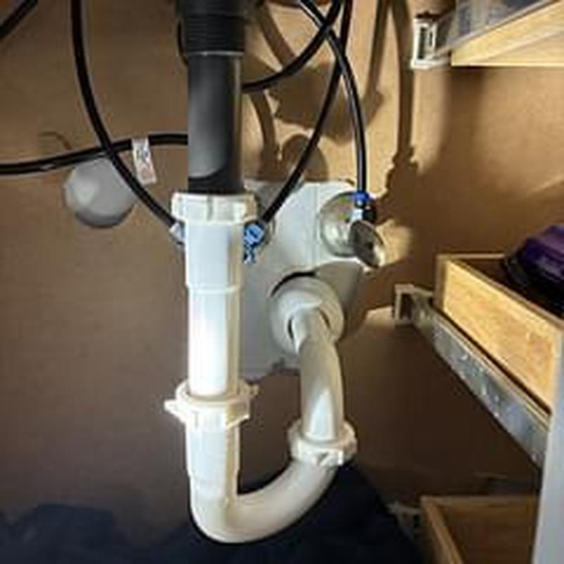 P-trap drain pipe with clear connections under sink