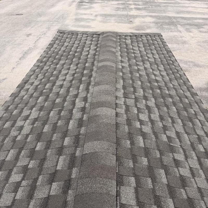 Asphalt shingle ridge cap installation on flat roof