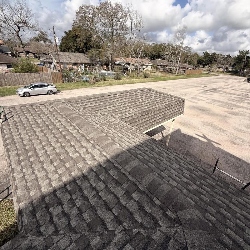 Asphalt shingle roof with ridge cap installation