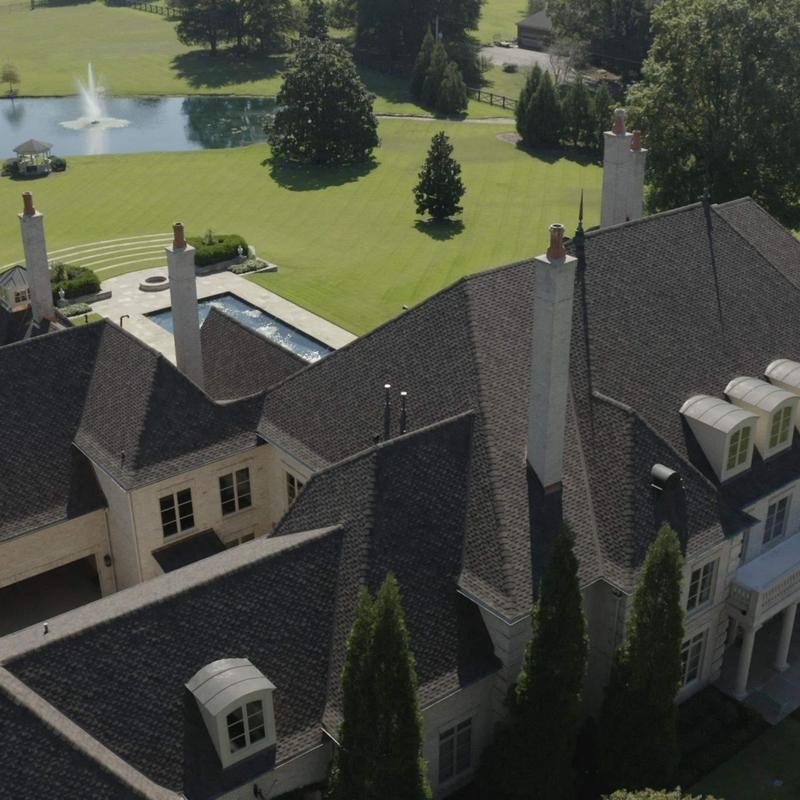 Designer asphalt shingle roof with custom flashing in Collierville
