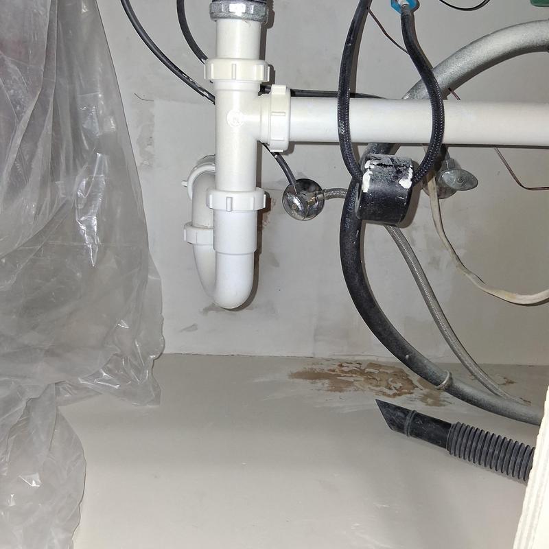 PVC sink drain pipes with water damage patching