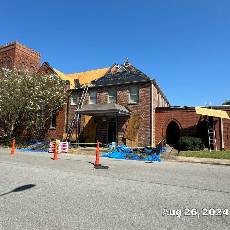 Asphalt shingle roof replacement on historic building