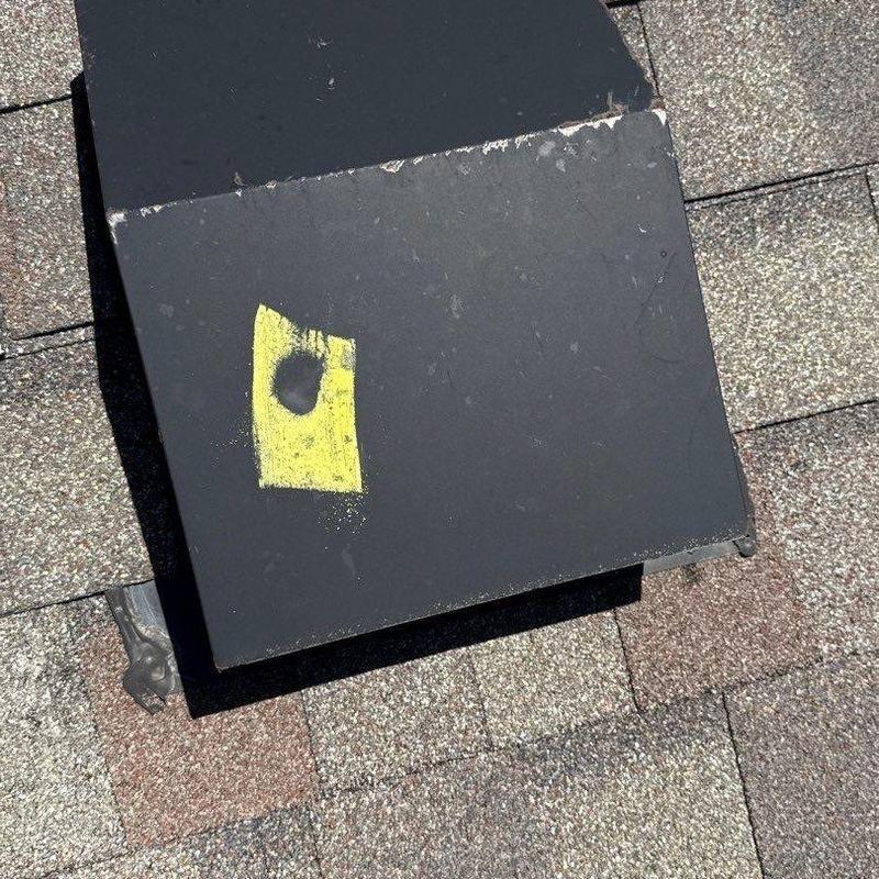 Ridge vent with hail damage marked in yellow