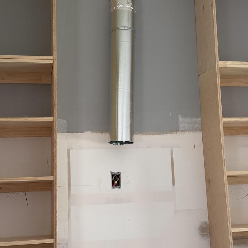 Stove exhaust vent pipe installation above wall cabinets