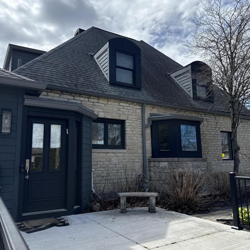 Dormer window and roof leak inspection exterior view Dormer window and roof leak inspection exterior view