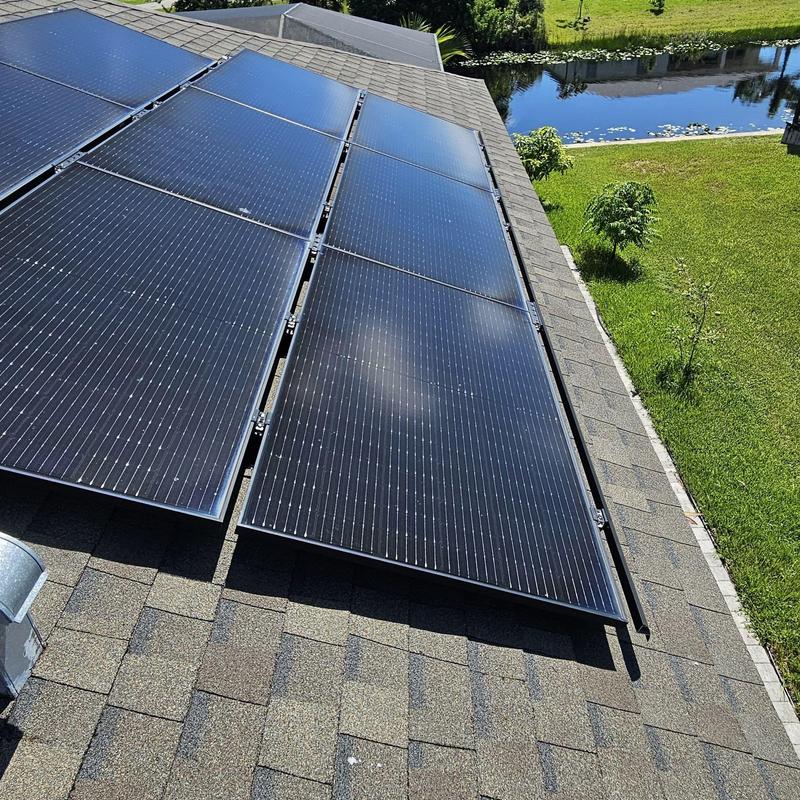 Solar panel mounting hardware and roof underlayment inspection