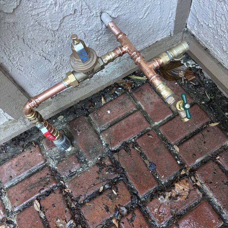 Hose bib and ball valve with pressure regulator installation