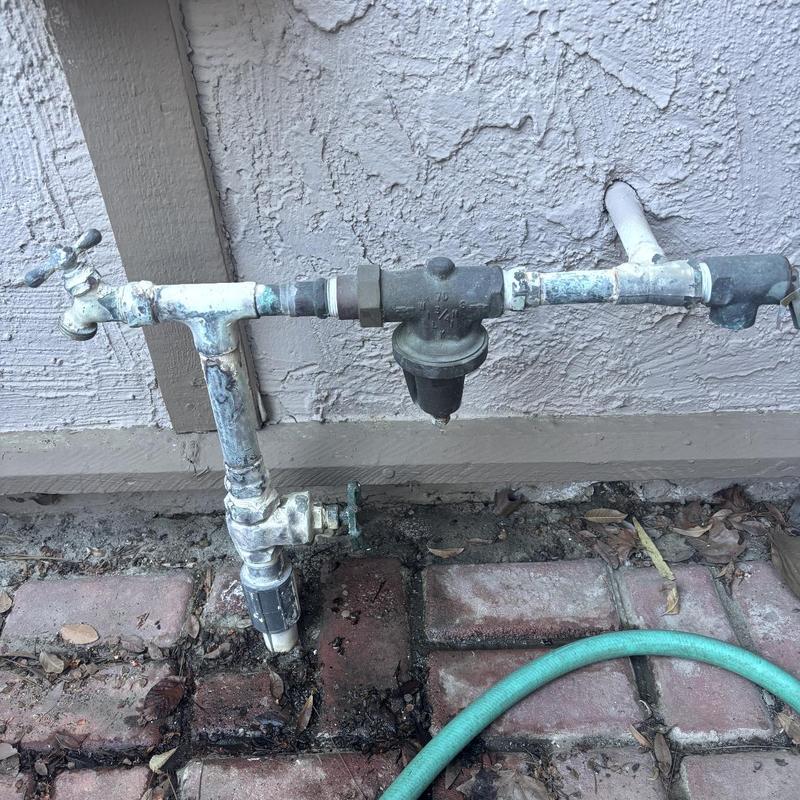 Hose bib with pressure regulator and ball valve installation