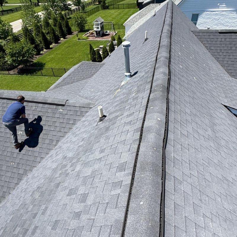 Asphalt shingle roof hail damage inspection with ridge vents
