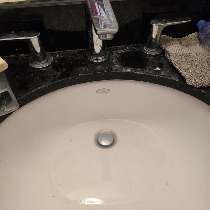 Basin drain and widespread faucet cleaning in bathroom sink