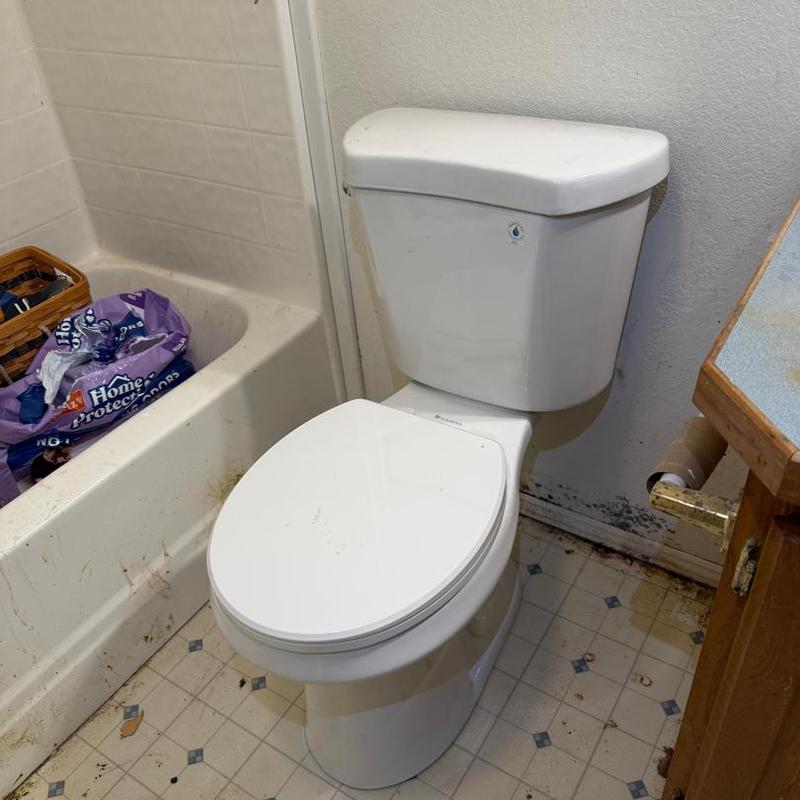 Customer-supplied toilet installed on existing flange