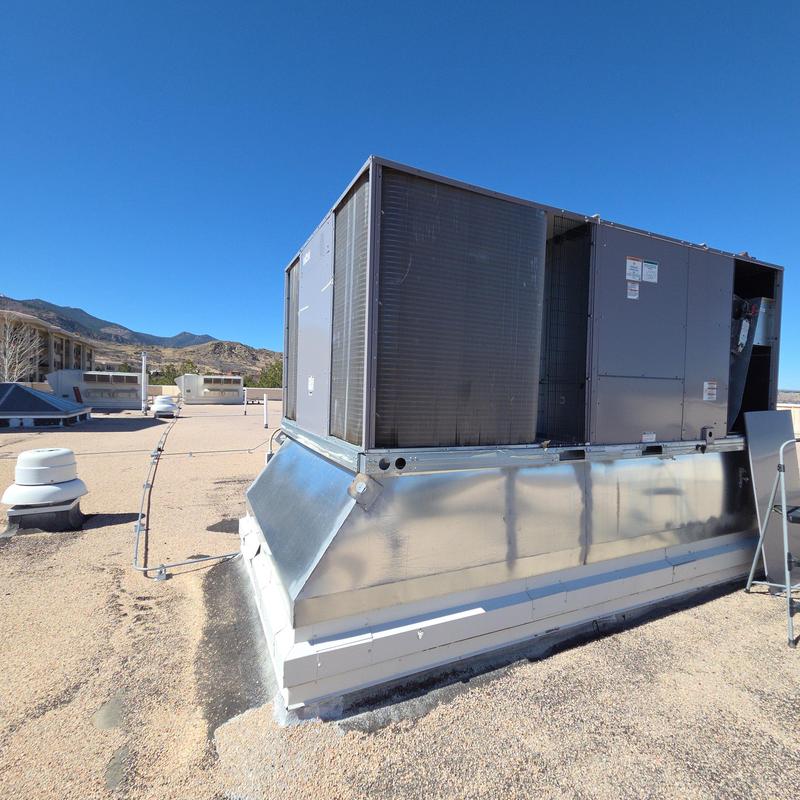 Rooftop HVAC unit on commercial building roof
