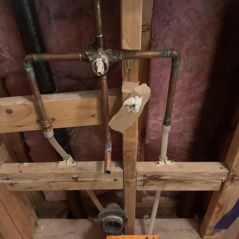 Moen shower valve plumbing behind wall studs
