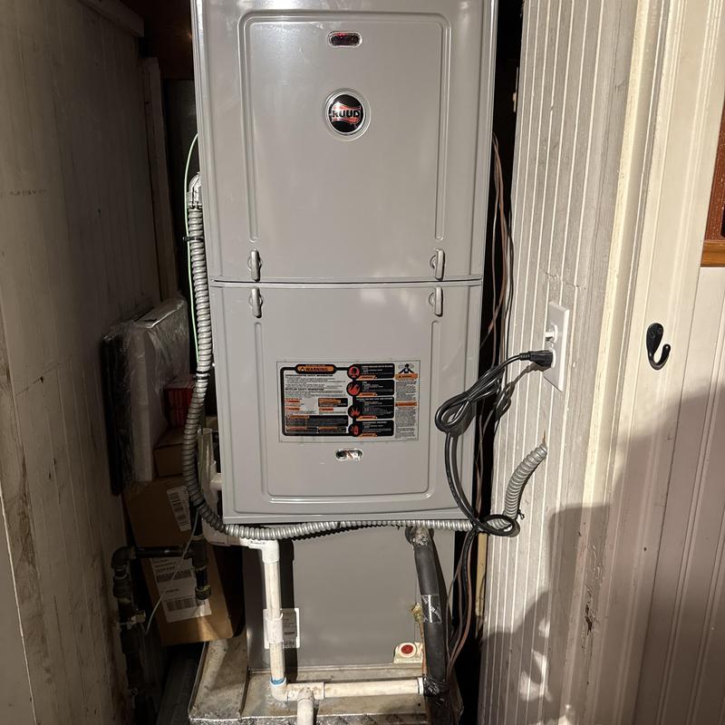 Ruud high efficiency gas furnace installed in closet Ruud high efficiency gas furnace installed in closet