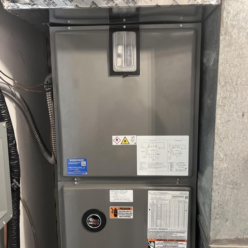 Ruud variable speed air handler installed in utility room Ruud variable speed air handler installed in utility room