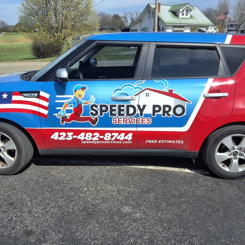 Roof repair service vehicle with company logo